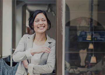 Woman smiling at someone