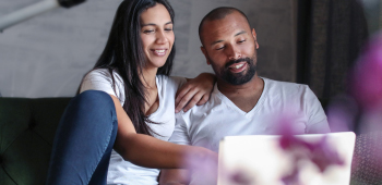 couple looking at laptop