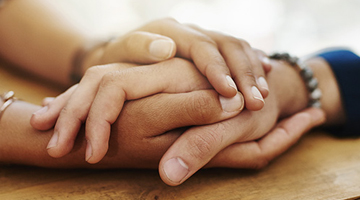 Hands holding